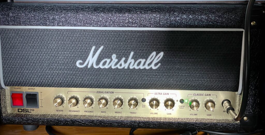 This photo shows the front panel of my Marshall DSL20HR.

From left to right, the settings are:

- Reverb: 0
- Resonance: 0
- Presence: 10 o'clock
- Bass: just above 10 o'clock
- Middle: 12:30
- Treble: 1 o'clock
- Volume: 9:30
- Gain: 9:30