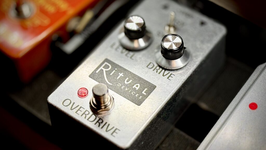 A close-up photo of the Grey Overdrive guitar effects pedal, made by Ritual Devices.